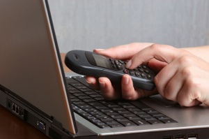 Laptop and Telephone Laptop and Telephone